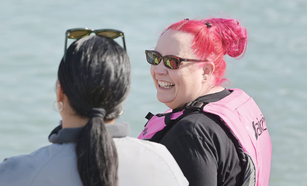 Dr Siouxsie Wiles about to go for a paddle in Gisborne on Friday.