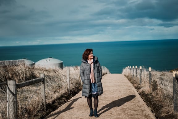 Sue Kim near Tunnel Beach, Ōtepoti.
