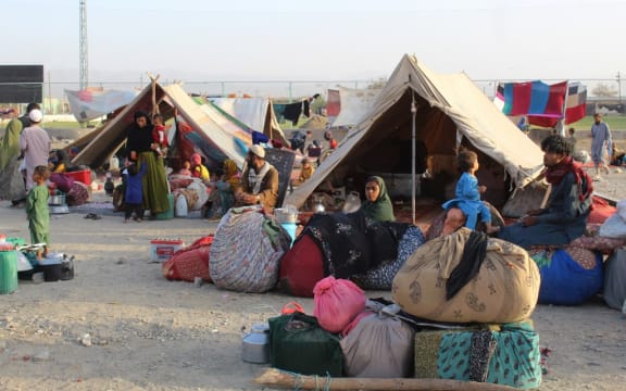 Afghan refugees rest in tents at a makeshift shelter camp in Chaman, a Pakistani town at the border with Afghanistan, after the US pulled all its troops out of Afghanistan to end a brutal 20-year war.