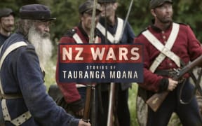 A group of 19th century British soldiers with bayonetted rifles. Text reads "NZ Wars, Stories of Tauranga Moana"