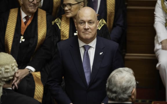 Prime Minister Christopher Luxon listens to the government's Speech from the Throne.