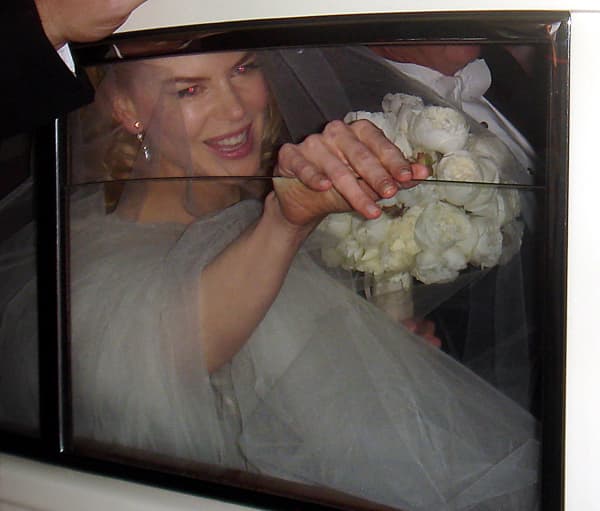 Nicole Kidman arrives for her wedding to Keith Urban in the Sydney seaside suburb of Manly, 25 June 2006.  The service is to be held in the Cardinal Ceretti Memorial Chapel -- an ornate sandstone church with parquet flooring, stained glass windows, pipe organ and vaulted ceiling.  AFP PHOTO/MATTHEW SMITH (Photo by MATTHEW SMITH / AFP)