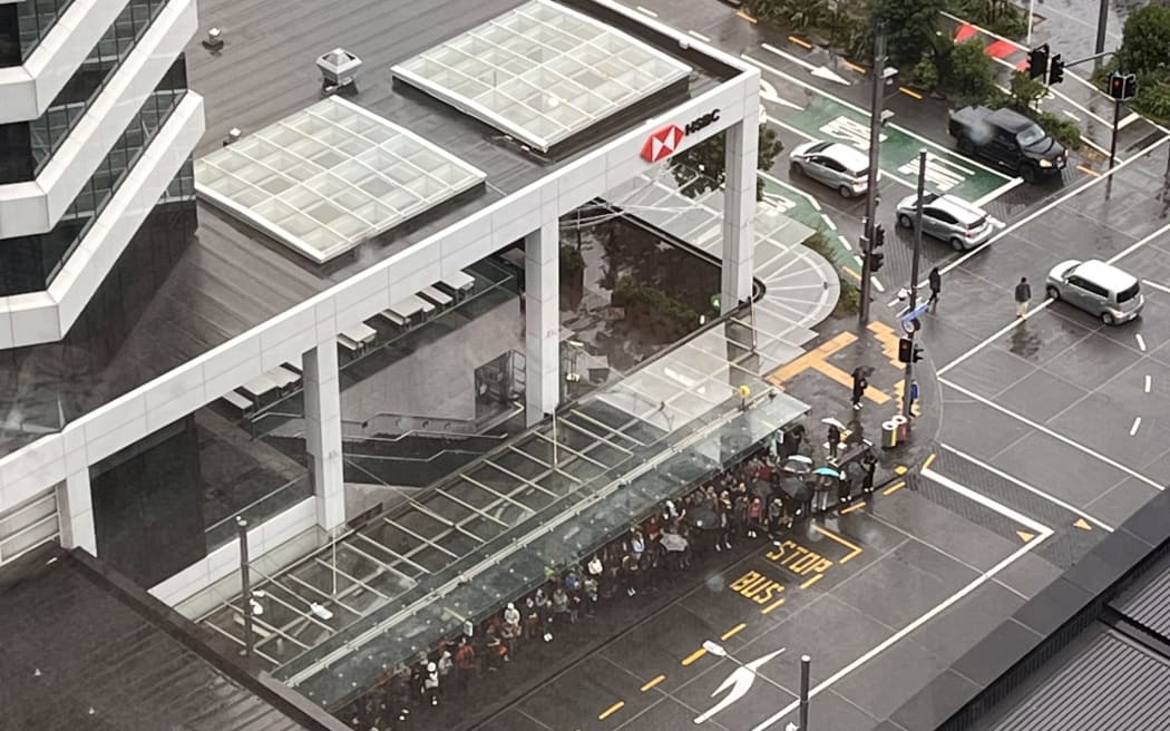 People waiting for public transport on 9 May, 2023.
