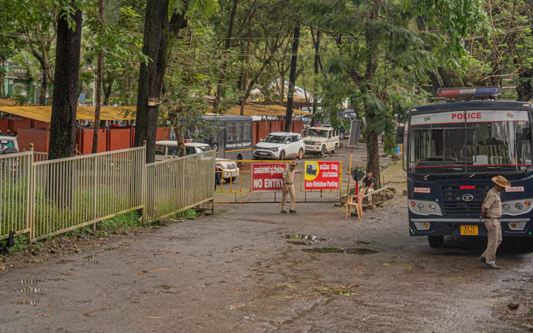 The roads lining the Nethravathi river bathing ghat have now been converted into an active crime scene, including armed Special Investigation Team police officers.
