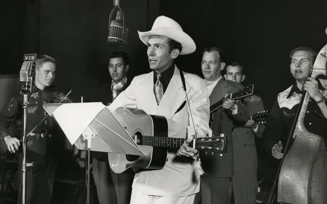Hank Williams at the WSM radio studio, Nashville, c.1948.
Credit: Les Leverett Collection