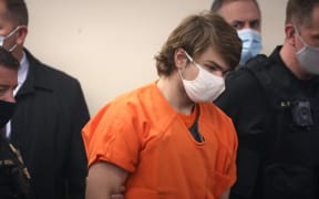BUFFALO, NEW YORK - MAY 19: Payton Gendron arrives for a hearing at the Erie County Courthouse on May 19, 2022 in Buffalo, New York. Gendron is accused of killing 10 people and wounding another 3 during a shooting at a Tops supermarket on May 14 in Buffalo. The attack was believed to be motivated by racial hatred.   Scott Olson/Getty Images/AFP (Photo by SCOTT OLSON / GETTY IMAGES NORTH AMERICA / Getty Images via AFP)