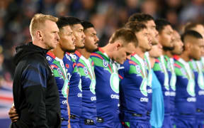 Andrew Webster Coach of the Warriors stands for the ANZAC day commemorations during the NRL Telstra Premiership, Warriors Vs Knights.