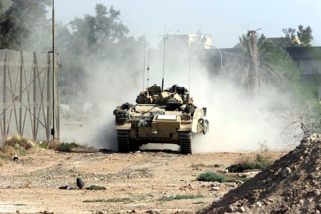 British Desert Rats drive their Warrior tank into the north of Basra, Iraq, 06 April 2003.