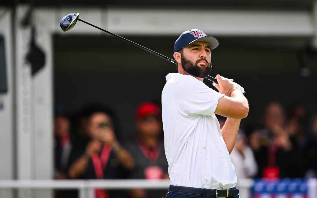 Team USA golfer Scottie Scheffler plays a tee shot during the 2024 Presidents Cup in Montreal in September.