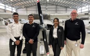 New Zealand International Commercial Pilot Academy students (from left) Rishabh Mittal, Shlok Bajpai, Mansi Nirmal and chief executive Gerard Glanville in Whanganui. Photo/Supplied