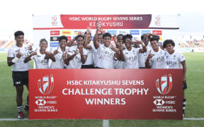 Fiji players celebrate the Challenge Trophy Final win over Spain.