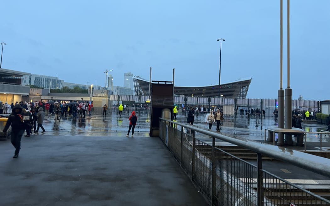 Fans turn out on a wet French evening for the Rugby World Cup semi-final between England and South Africa.