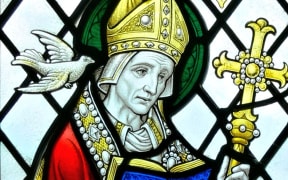 Stained glass window (1934) showing Saint David. Our Lady and Saint Non's chapel, St David's, Wales.