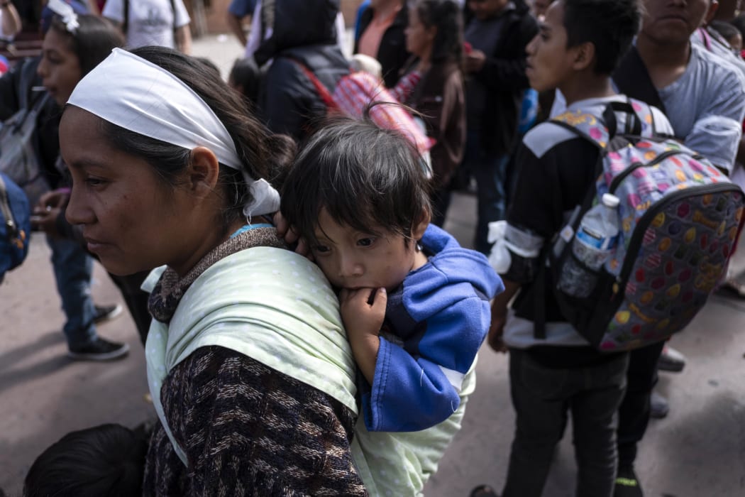 Central American migrants traveling in the "Migrant Via Crucis" caravan are pictured as they head to El Chaparral border crossing in Tijuana, Baja California state, Mexico, on April 29, 2018.