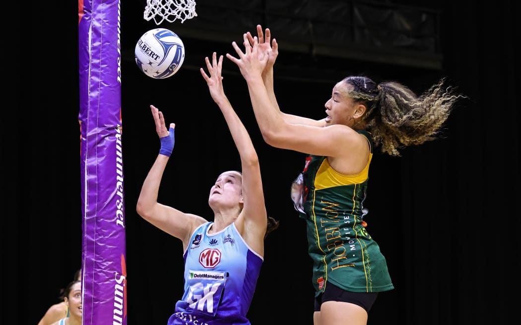 Catherine Hall of the Mystics and Saviour Tui of the Magic during the ANZ Premiership round one match between the Magic and Mystics at Globox Arena in Hamilton, New Zealand on Saturday April 13, 2024. Copyright photo: Aaron Gillions / www.photosport.nz