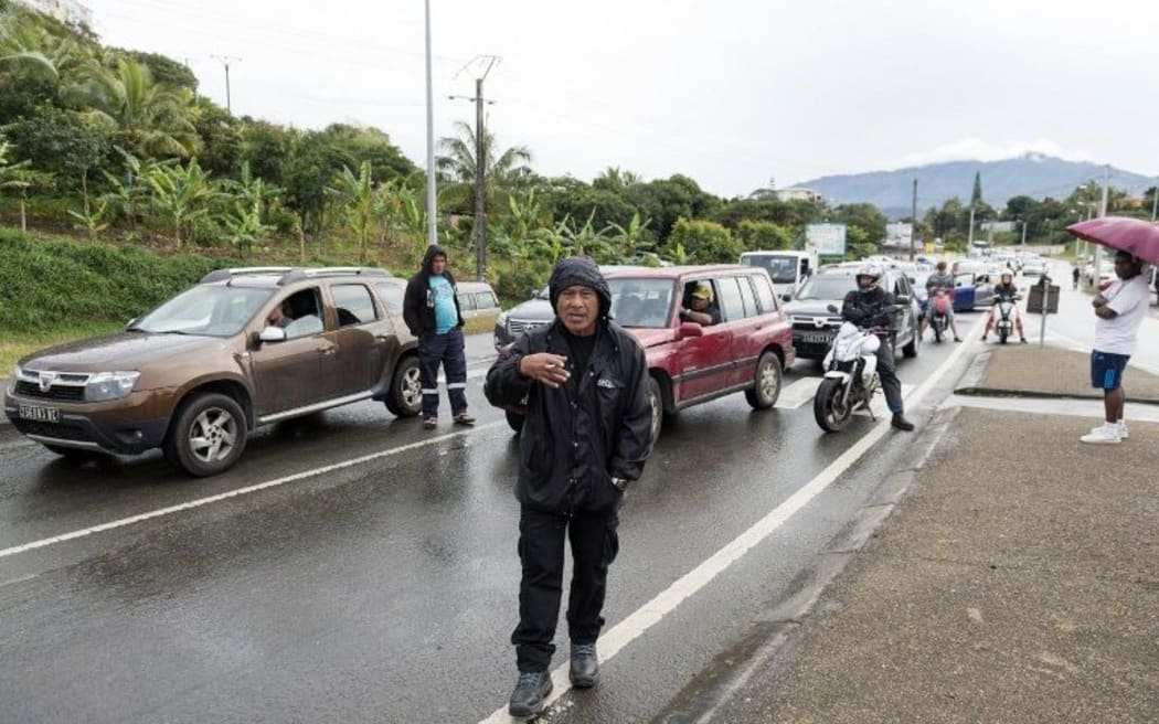 Angry motorists in New Caledonia during a road blockade.