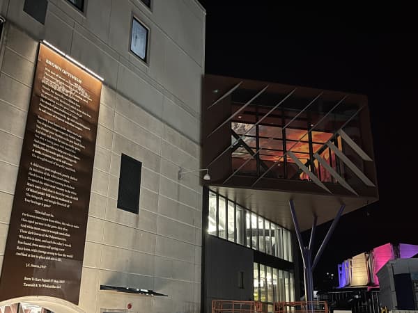 The poem 'Brown Optimism' by the late J.C. Sturm on the side of Te Matapihi ki te Ao Nui.