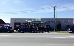 Crowds gather outside the Alexandra District Club for the funeral of Ashburton shooting victim Leigh Cleveland.