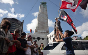Protestors and Police standoff as police move concrete barricades