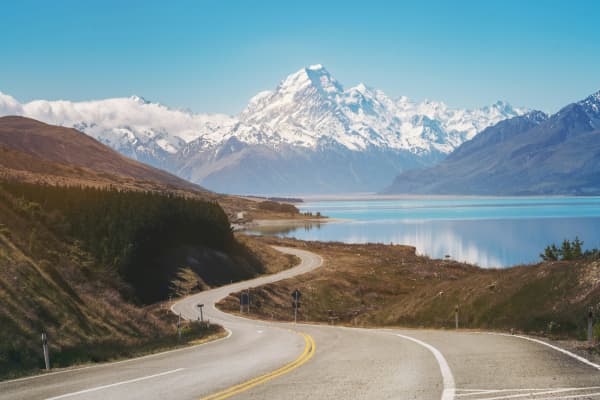 A winding road near a scenic travel route in New Zealand.