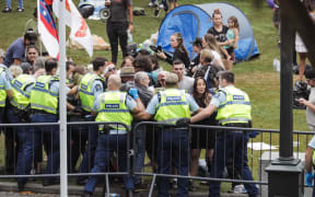 Police and protesters at Parliament during the Covid-19 protest on 10 February 2022.