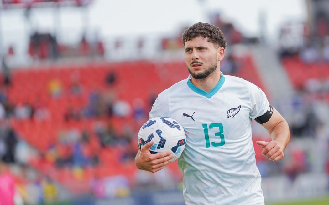 Liberato Cacace #13 of New Zealand runs with the ball during the International Friendly Match between Ukraine and New Zealand at BMO Field in Toronto, Canada, on June 10, 2025. The final score is New Zealand 1-2 Ukraine. (Photo by Leonardo Ramirez/ Eyepix Group) (Photo by Eyepix/NurPhoto) (Photo by Eyepix / NurPhoto via AFP)