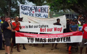 Hundreds march in Port Vila to demand an end to violence against women in Vanuatu.