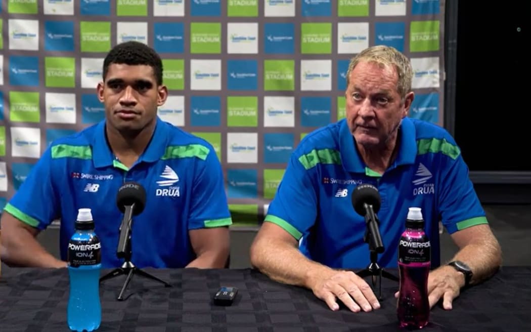 Meli Derenalagi and Drua head coach Mick Byrne speak to media following their historic Super Rugby win