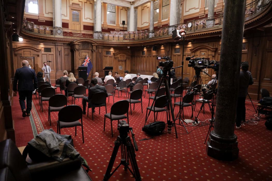 Media wait for National Party leader Judith Collins to emerge from caucus and speak on her demotion of Simon Bridges,