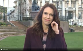 The PM battles a firing earpiece, angry birds and big bells fielding questions about the Bledisloe Cup on Tuesday.