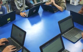 Ōwairaka Primary School students write letters to the local board to keep funding for their community events.