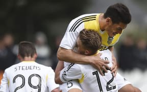 Michael Boxall (L) and Tyler Boyd of the Wellington Phoenix celebrate a goal.