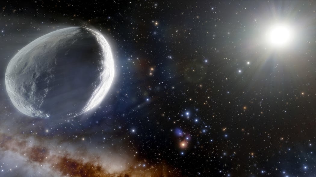 This illustration shows the distant Comet Bernardinelli-Bernstein as it might look in the outer Solar System.