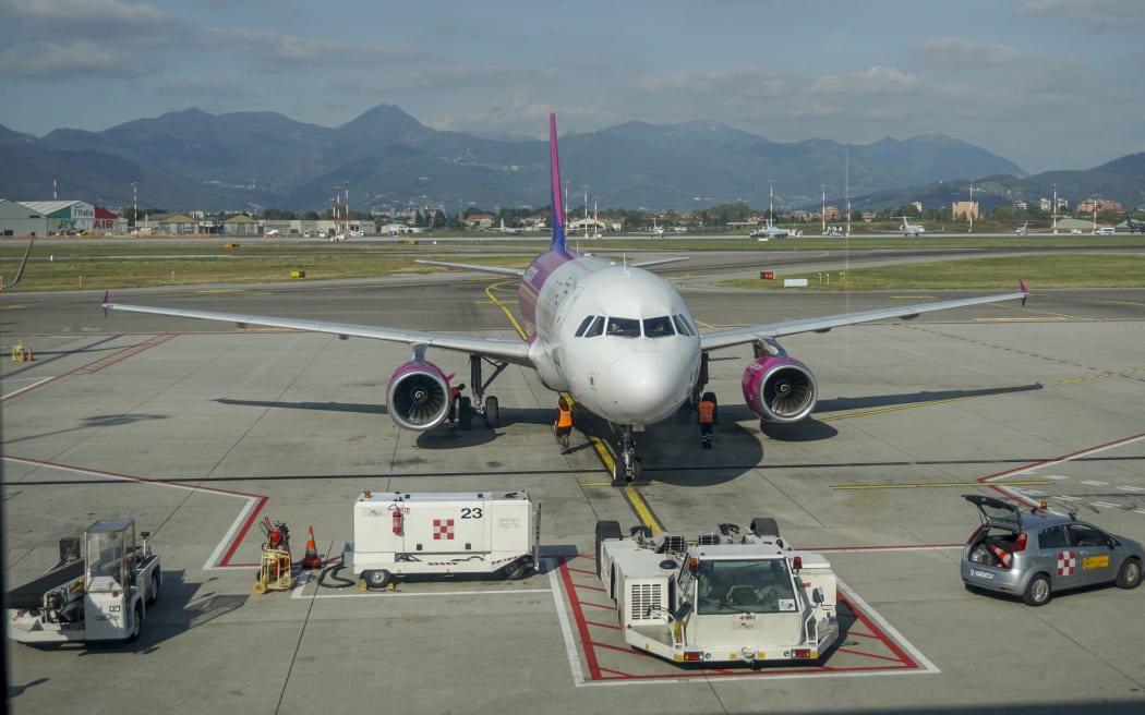 A plane at Milan Bergamo airport in Milan , Italy.