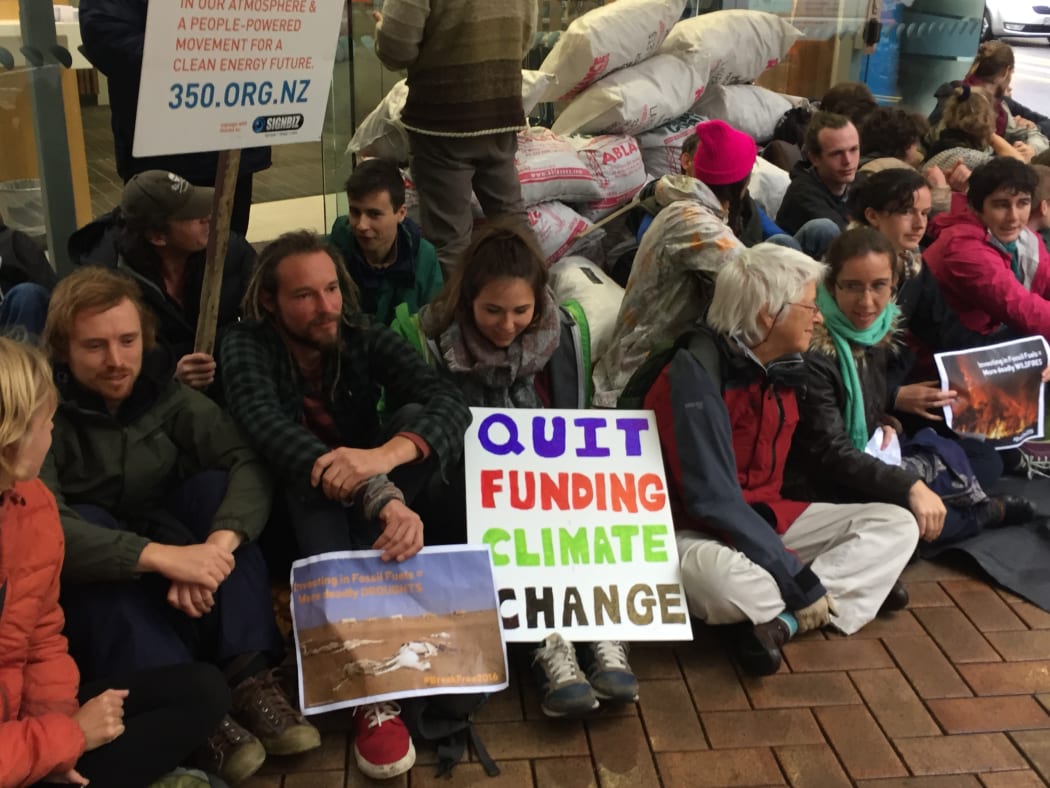 Bags of coal blocked an entrance to the bank.