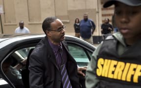 Baltimore Police Officer Caesar Goodson Jr. arrives for his murder trial in the death of Freddie Gray, at the Baltimore Circuit Court House on June 23, 2016 in Baltimore,