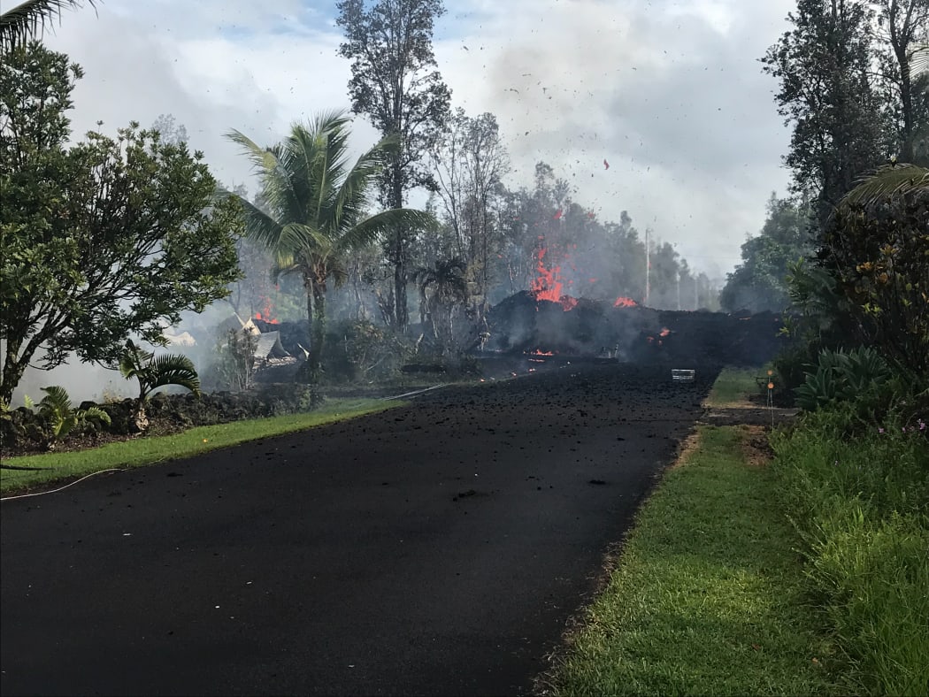 Fissure at Leilani and Kaupili Streets in Leilani Estates subdivision. Lava on the road was approximately 2 m thick.