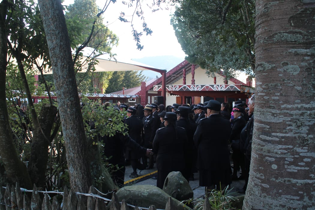 Māori Wardens are welcomed onto Turangawaewae Marae.