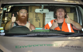 Two people helping deliver goods in response to Cyclone Gabrielle for The Environment Centre, Hawkes Bay.