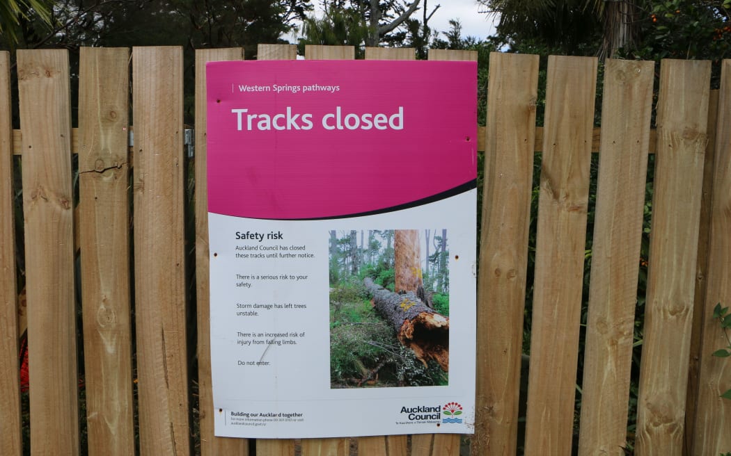 A sign warning of dangers around the pines at Western Springs.