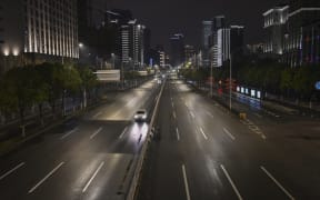 General view of a street in Wuhan on January 26, 2020, a city at the epicentre of a viral outbreak that has killed at least 56 people and infected nearly 2,000. - China on January 26 expanded drastic travel restrictions to contain an epidemic that has killed 56 people and infected nearly 2,000,