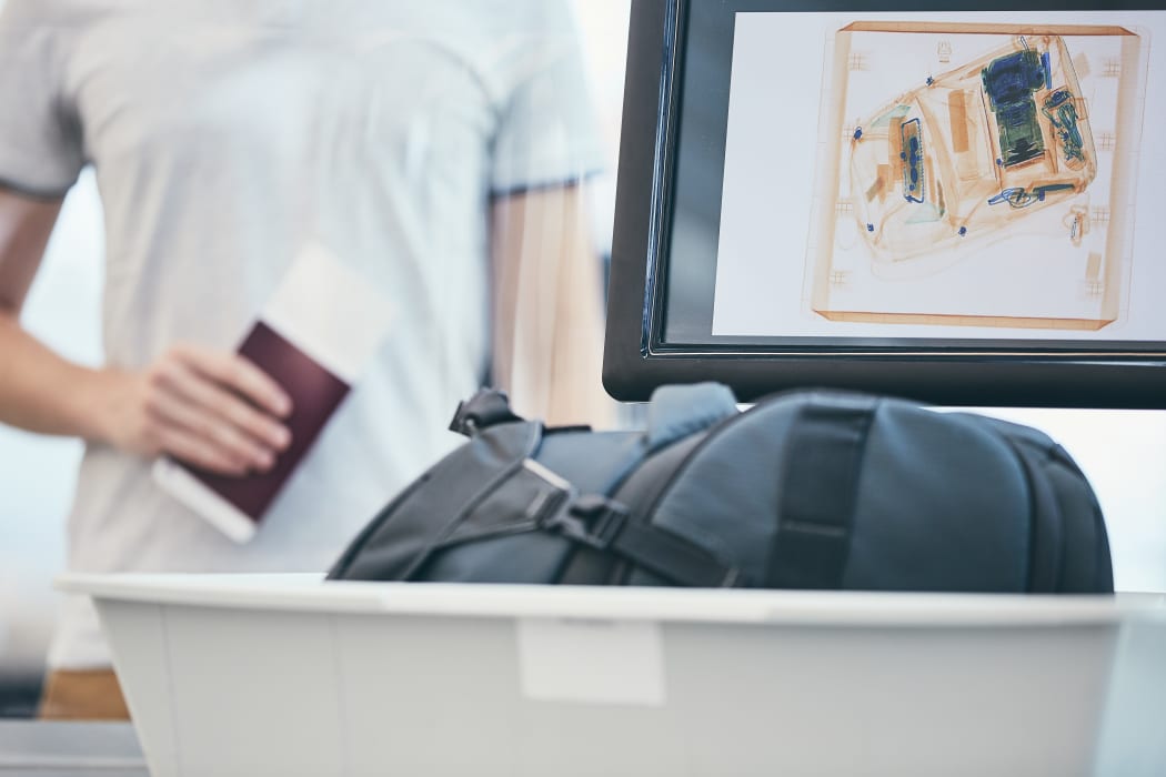Airport security check. X-ray of luggage.