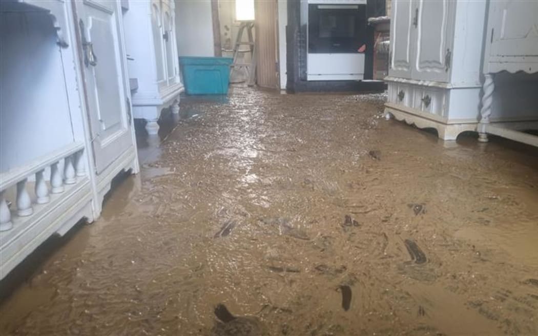 A layer of silt has been left throughout Tony Rattenbury's home.