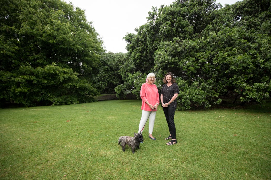 Anne Coney, left (with Pipi the dog), and Jo Malcolm at Dove-Myer Robinson park, where an Erebus national memorial may be built.