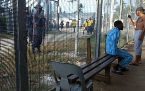 Manus Island detainees and security.