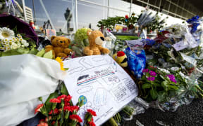 Flowers are being placed at Schiphol Airport near Amsterdam in memory of the victims of Malaysia Airlines flight MH17.