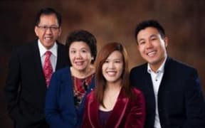 Parramatta shooting victim Curtis Cheng (left) with family.
