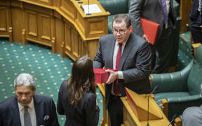 Grant Robertson and Prime Minister Jacinda Ardern enter The House to deliver Budget 2020.