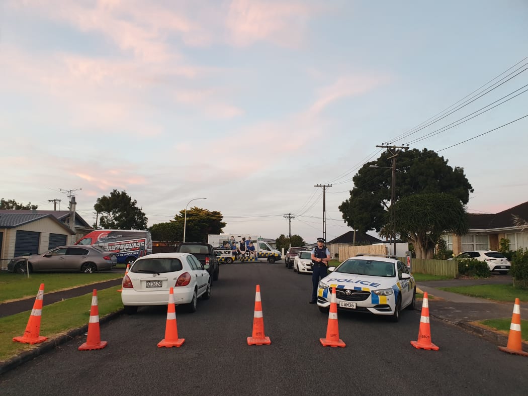 A cordon in Papatoetoe after a man was shot by police.