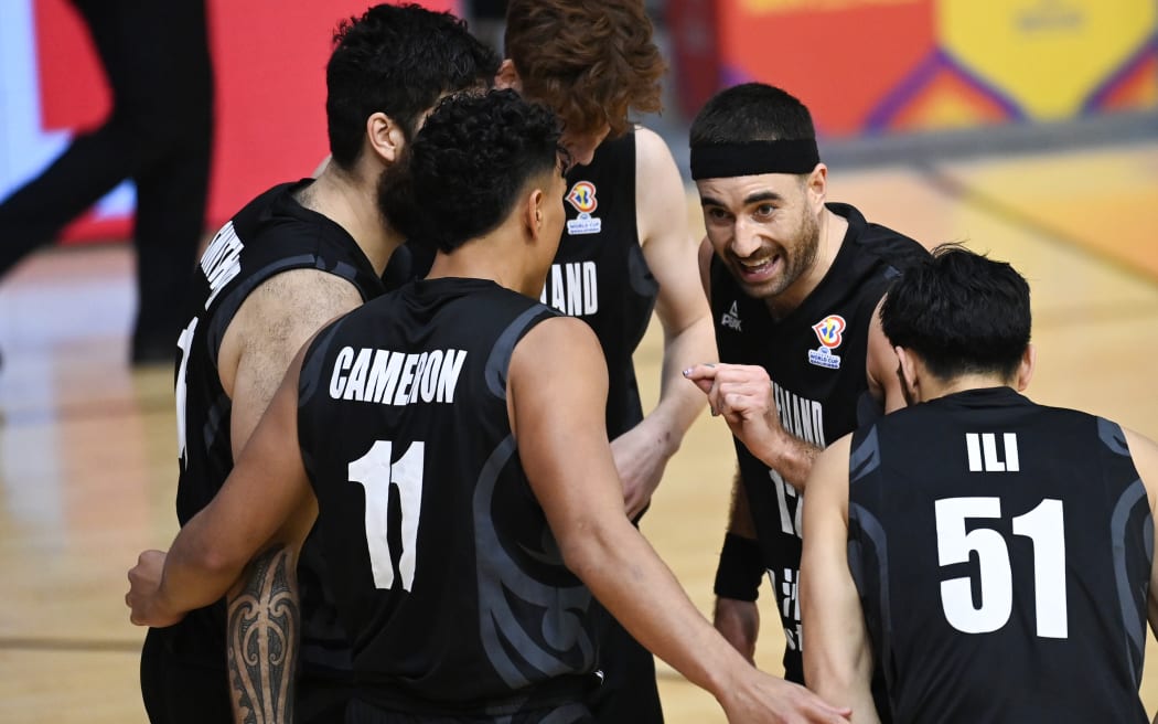 Ethan Rusbatch talks to his Tall Blacks team mates.